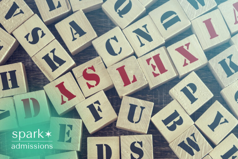 Wooden letter blocks spelling dyslexia among scattered alphabet blocks, illustrating learning differences.
