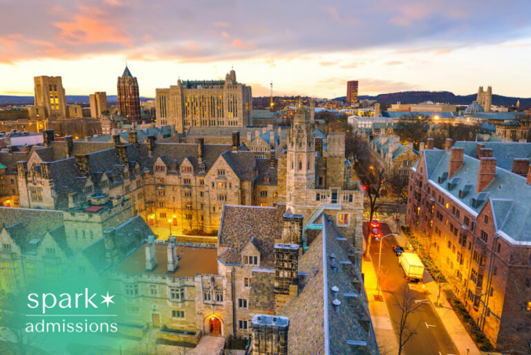Aerial view of an Ivy League university campus with historic buildings at sunset.