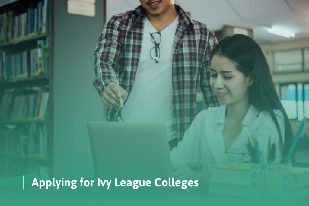 A man in a plaid shirt assists a smiling woman working on a laptop in a library setting