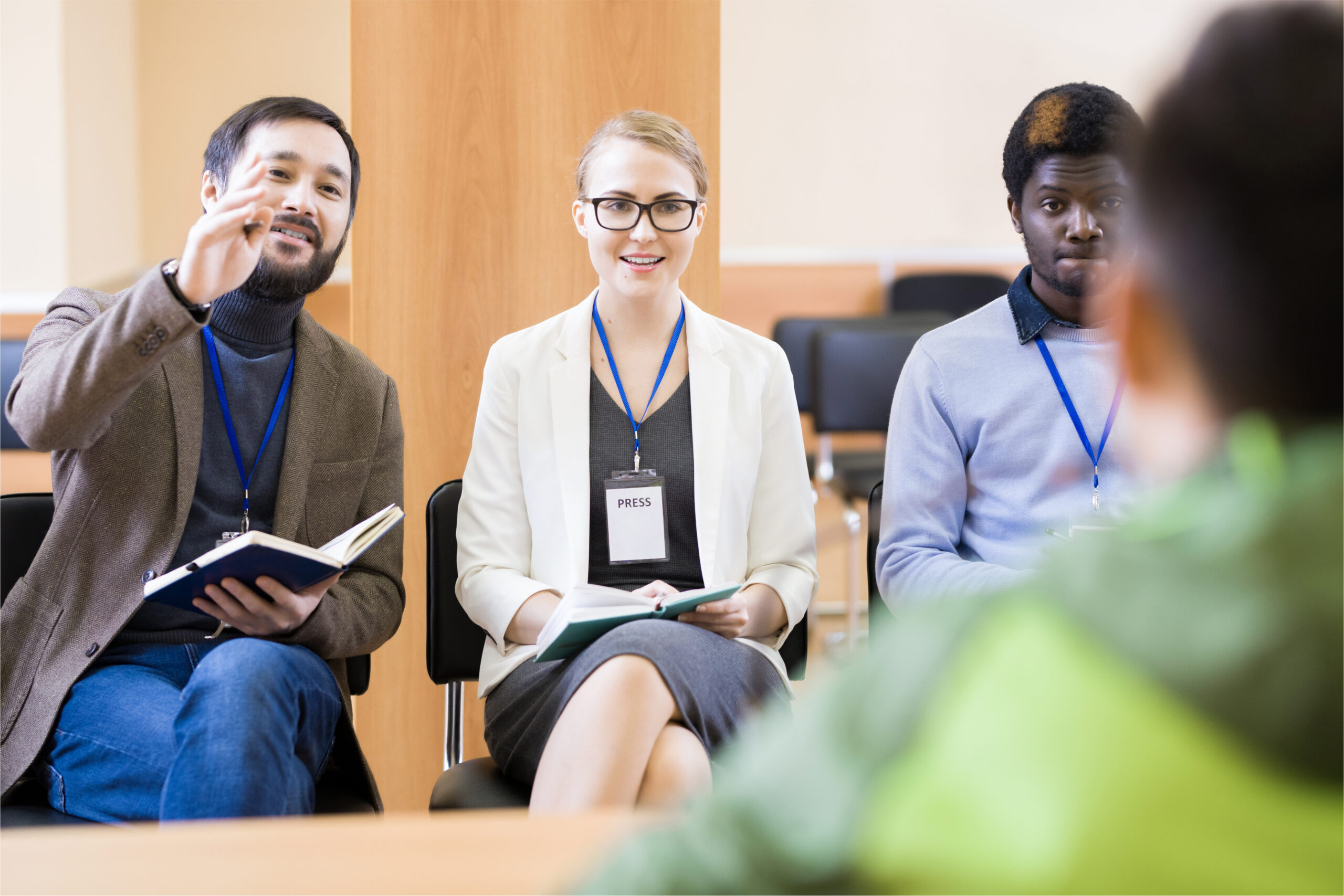 School official having a discussion with a student in an academic setting