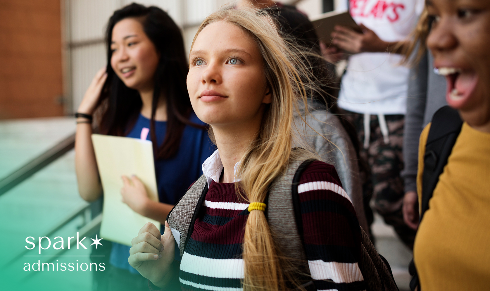 Group of students walking together, one looking ahead confidently with a backpack on