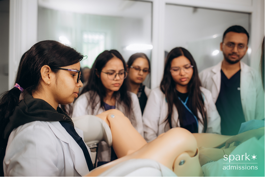 Group of medical students practice on a simulation mannequin during a clinical training session