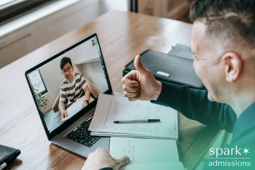 Student discussing college video introduction with admissions consultant